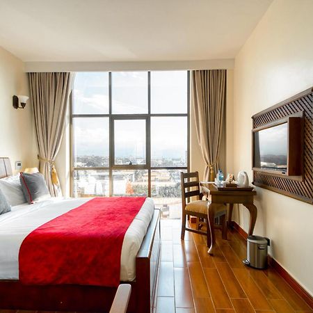 Kibo Palace Hotel Moshi Phòng bức ảnh