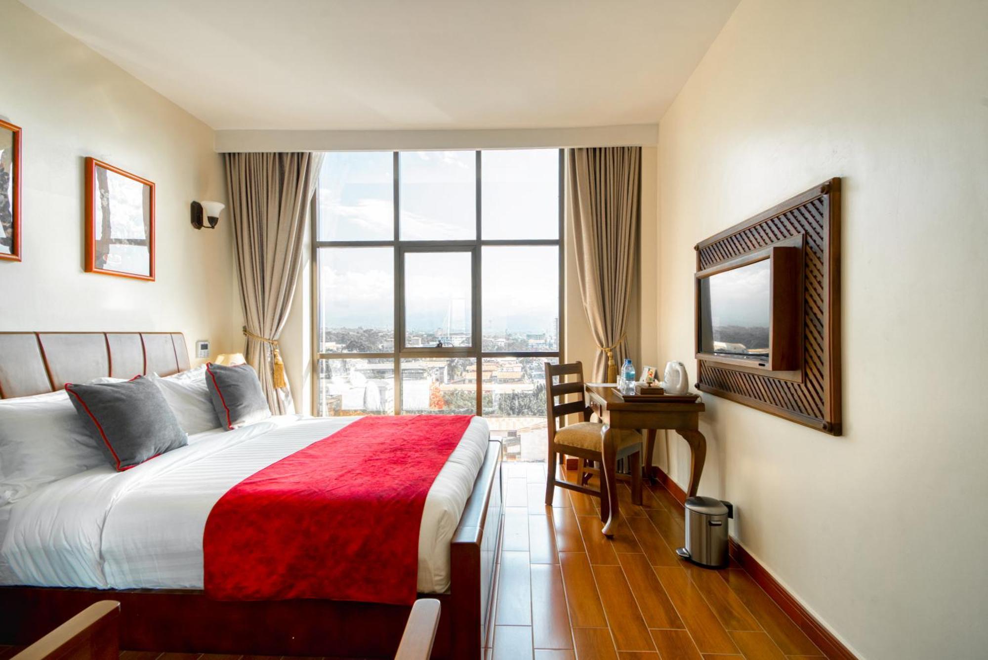 Kibo Palace Hotel Moshi Phòng bức ảnh